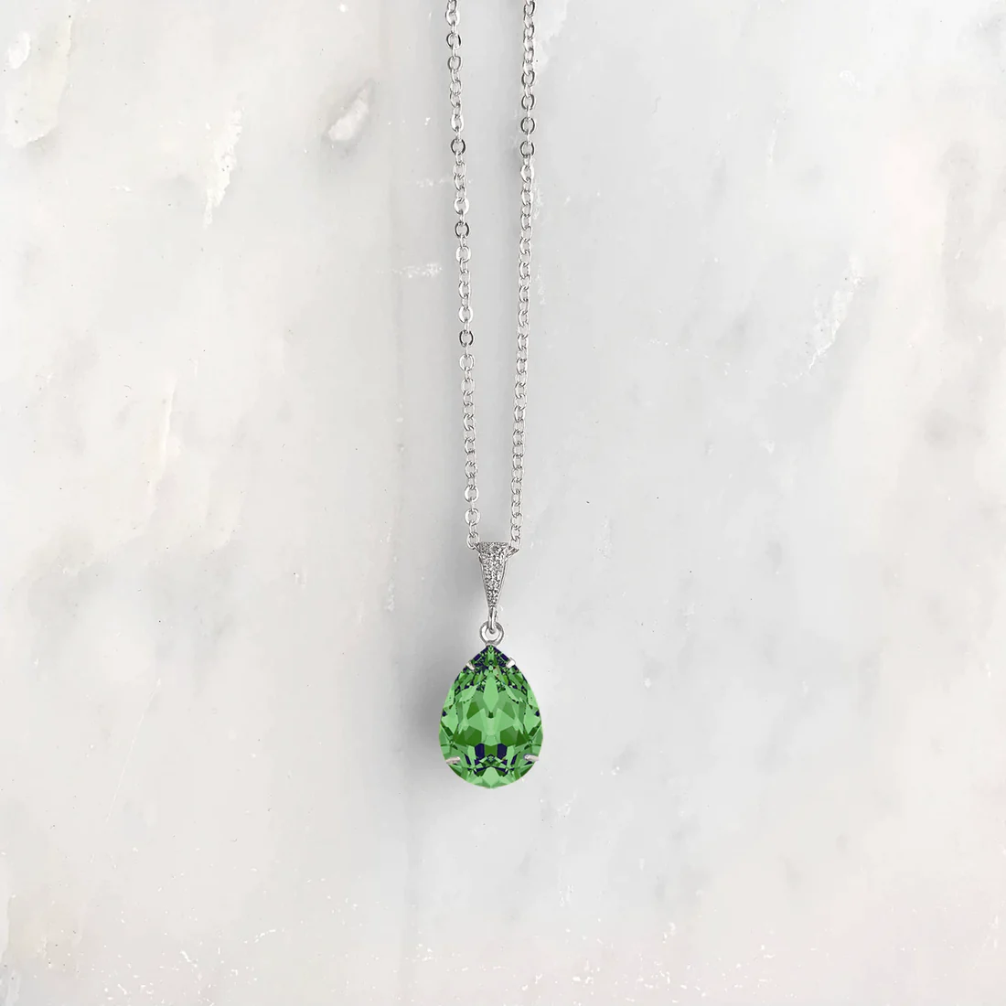 peridot crystal teardrop pendant necklace silver