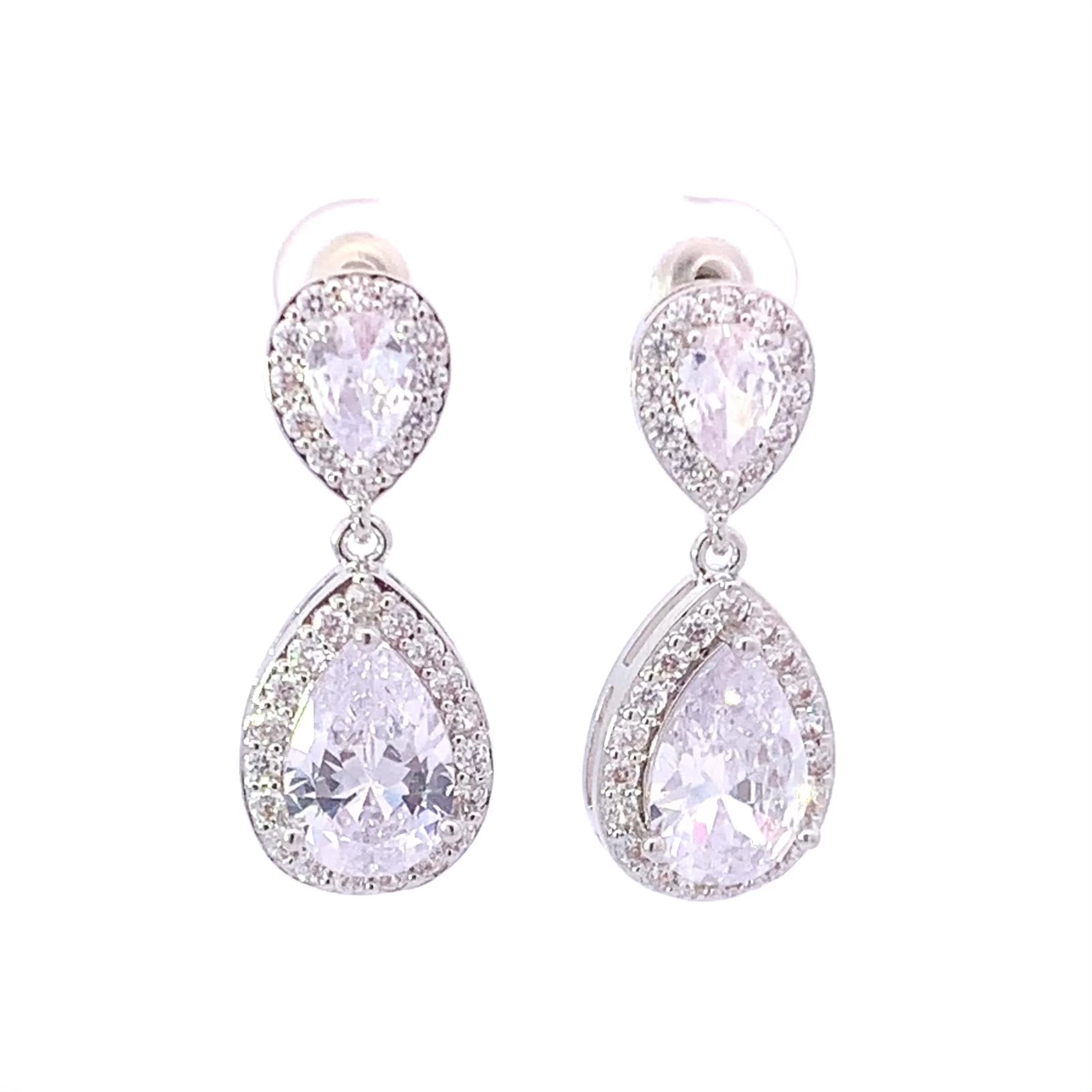 Bridal earrings in a pear shape with a crystal halo